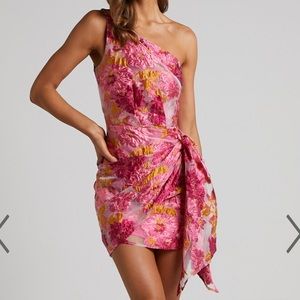 SHOWPO| BRAILEY ONE SHOULDER WRAP FRONT MINI DRESS IN PINK JACQUARD